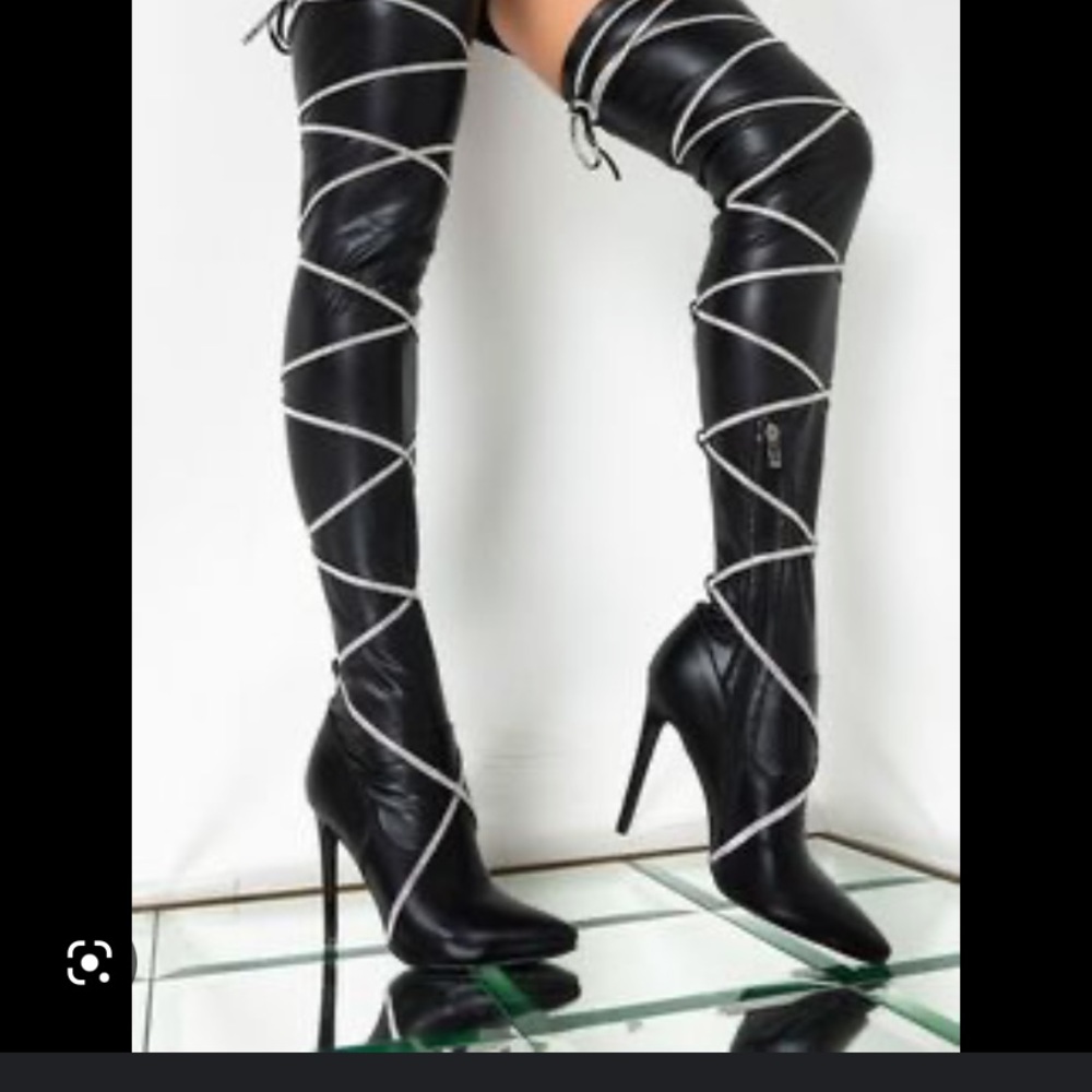 Thigh high belted vegan leather boots